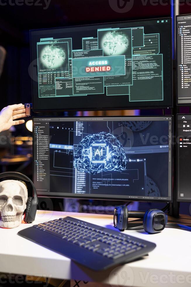 Hacker covering mouth in disbelief, seeing access denied warning on computer when hacking firewalls. Evil man shocked after failing to break into enterprise database, getting cyber attacks rejected photo