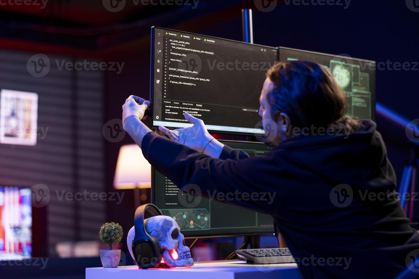 Cybercriminal inserting USB stick in PC with stealth malware that evades security software. Hacker uploading flash drive with script hiding malicious code from detection systems photo