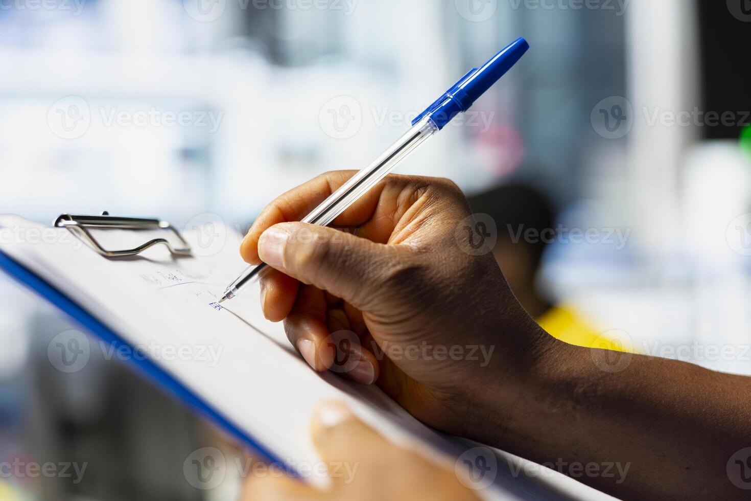 Male technician in solar panel factory reviews photovoltaic system performance on clipboard files. Worker analyzing production line guidelines to optimize efficiency, troubleshooting. photo