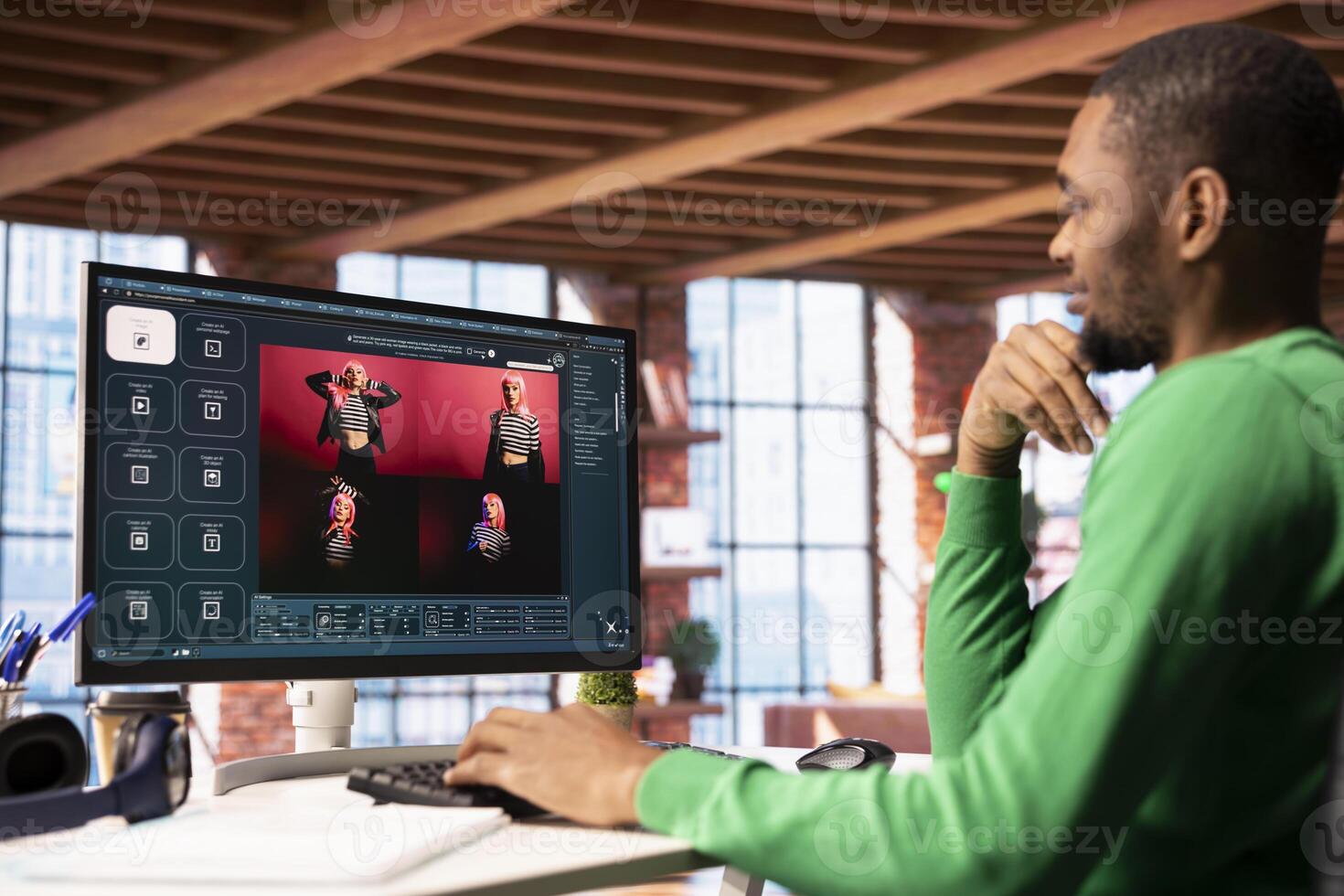 Smiling man in apartment workspace using AI software on computer display turning text prompt into photos. Upbeat african american person in home office uses text to image generative models on PC photo