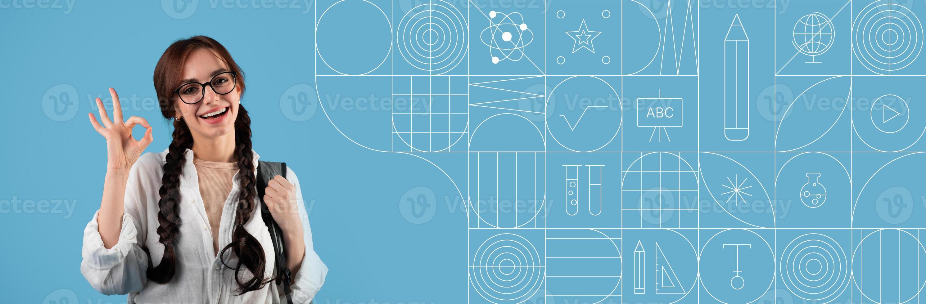 A student with glasses and braids expresses excitement while studying in a vibrant, educational environment. The background features unique illustrations related to learning and creativity. photo