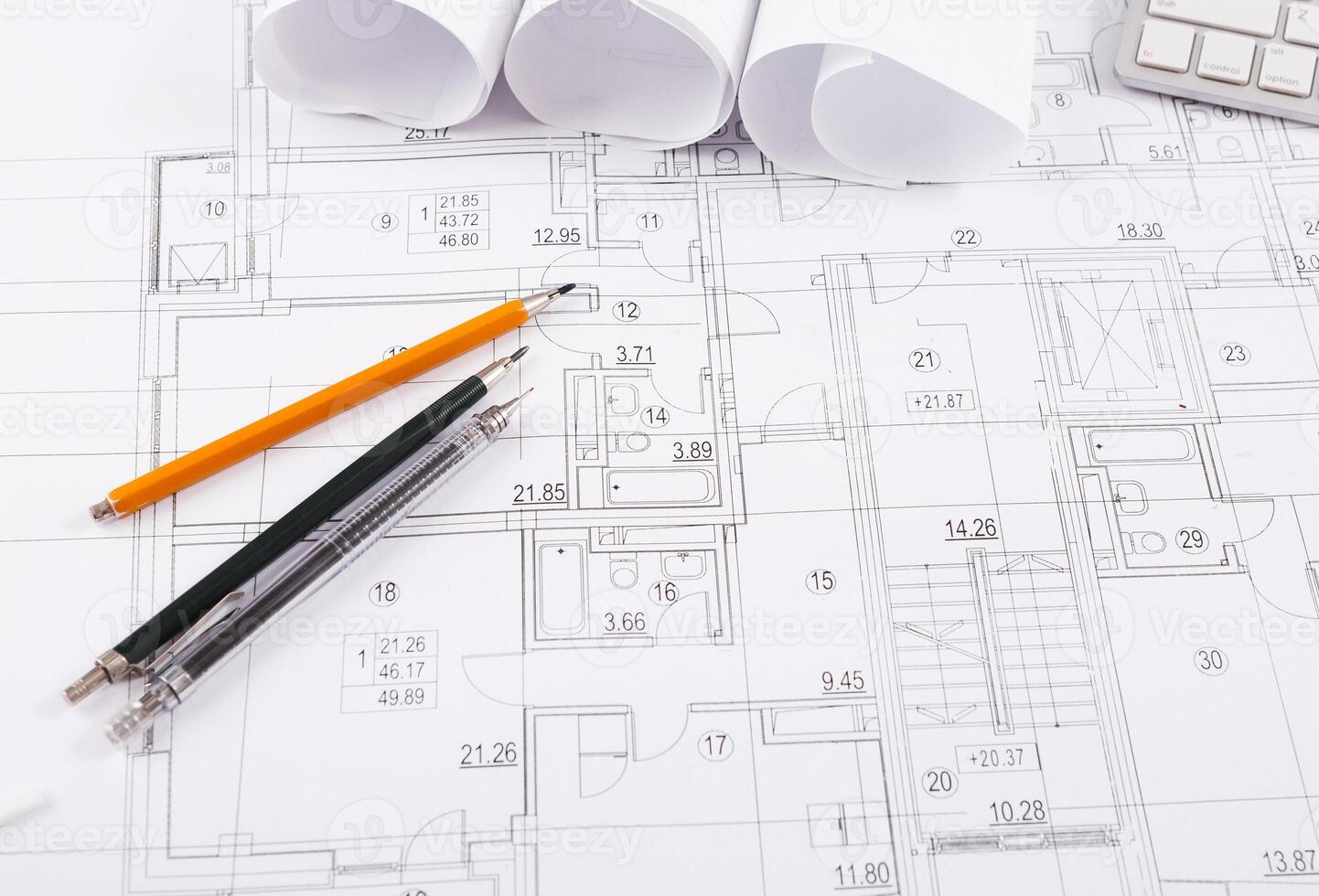 Workplace of architect. Pencils set on blueprint, engineering tools for creating new architectural project on table, copy space photo