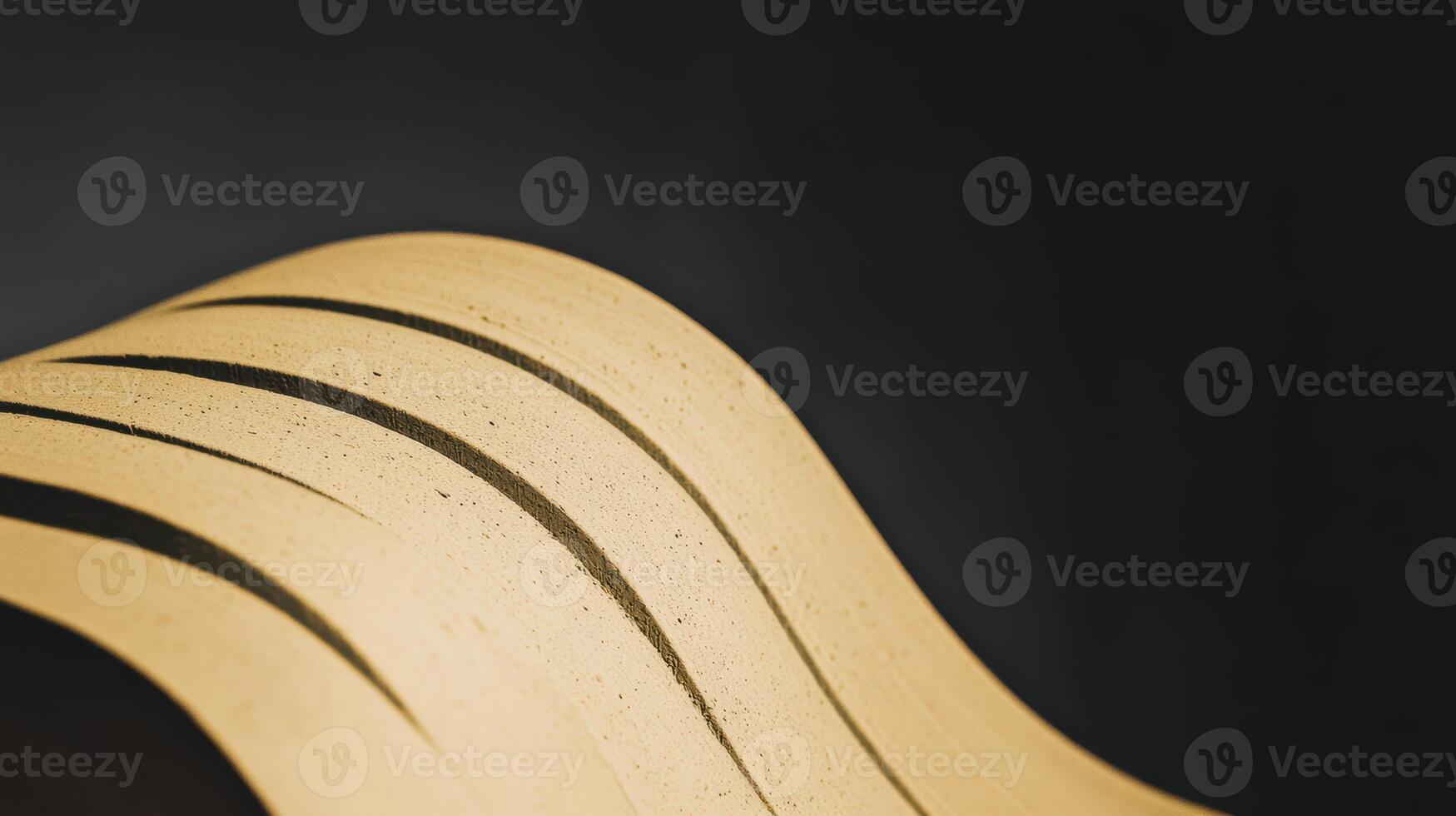 Curved surface with smooth lines and shadow play photo