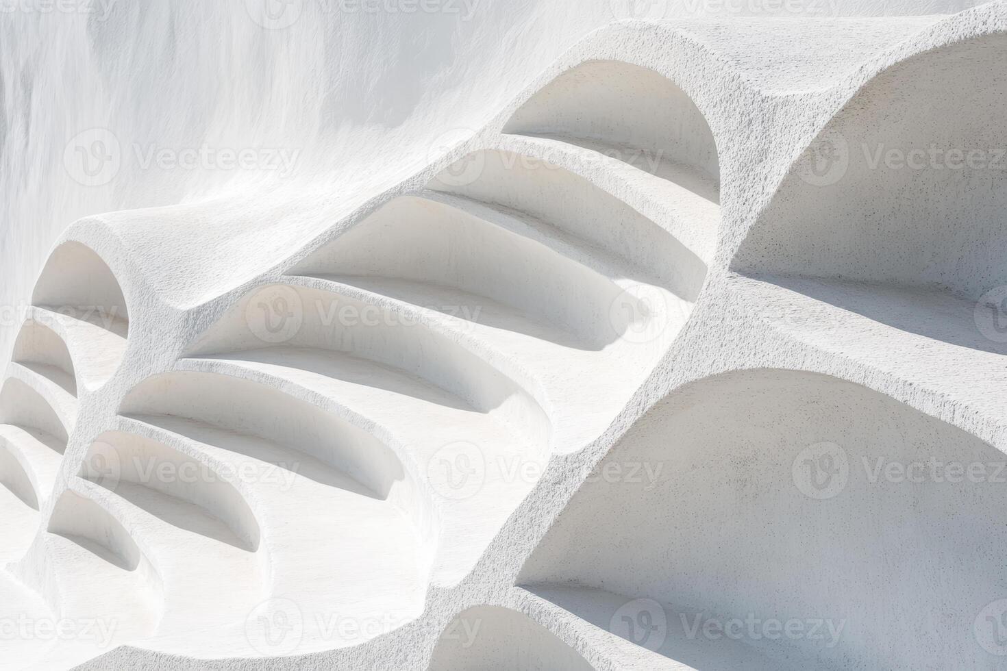 White architectural structure with unique patterns and curves photo