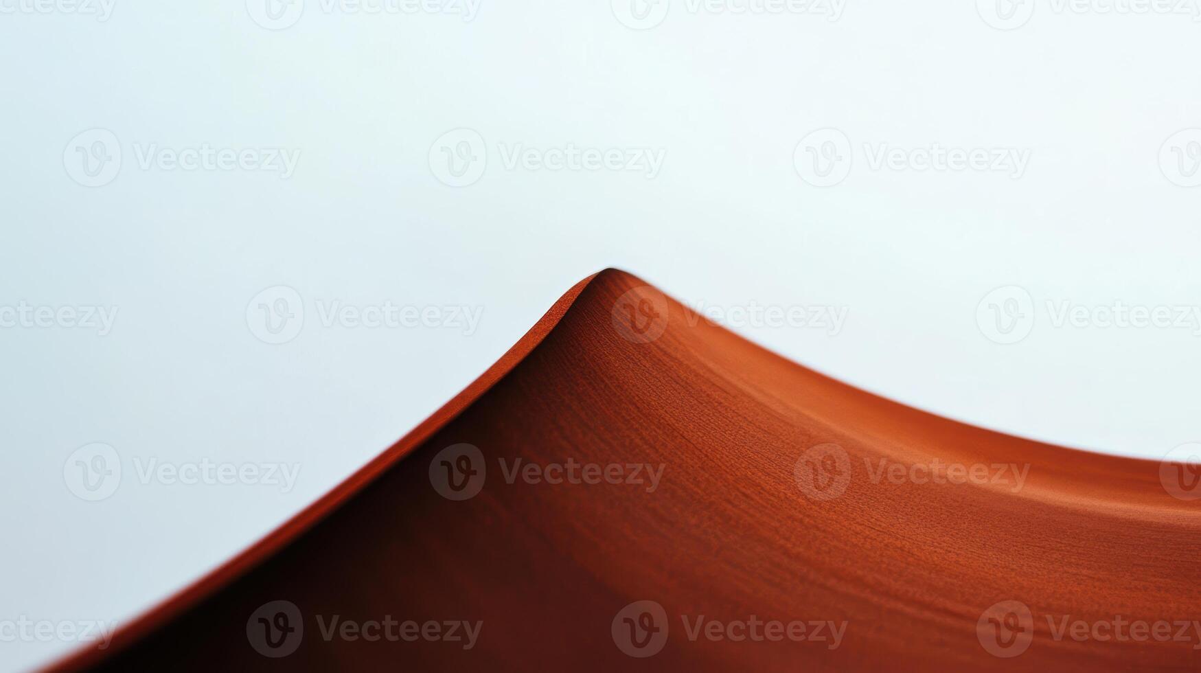 Curved brown surface creating subtle wave patterns photo