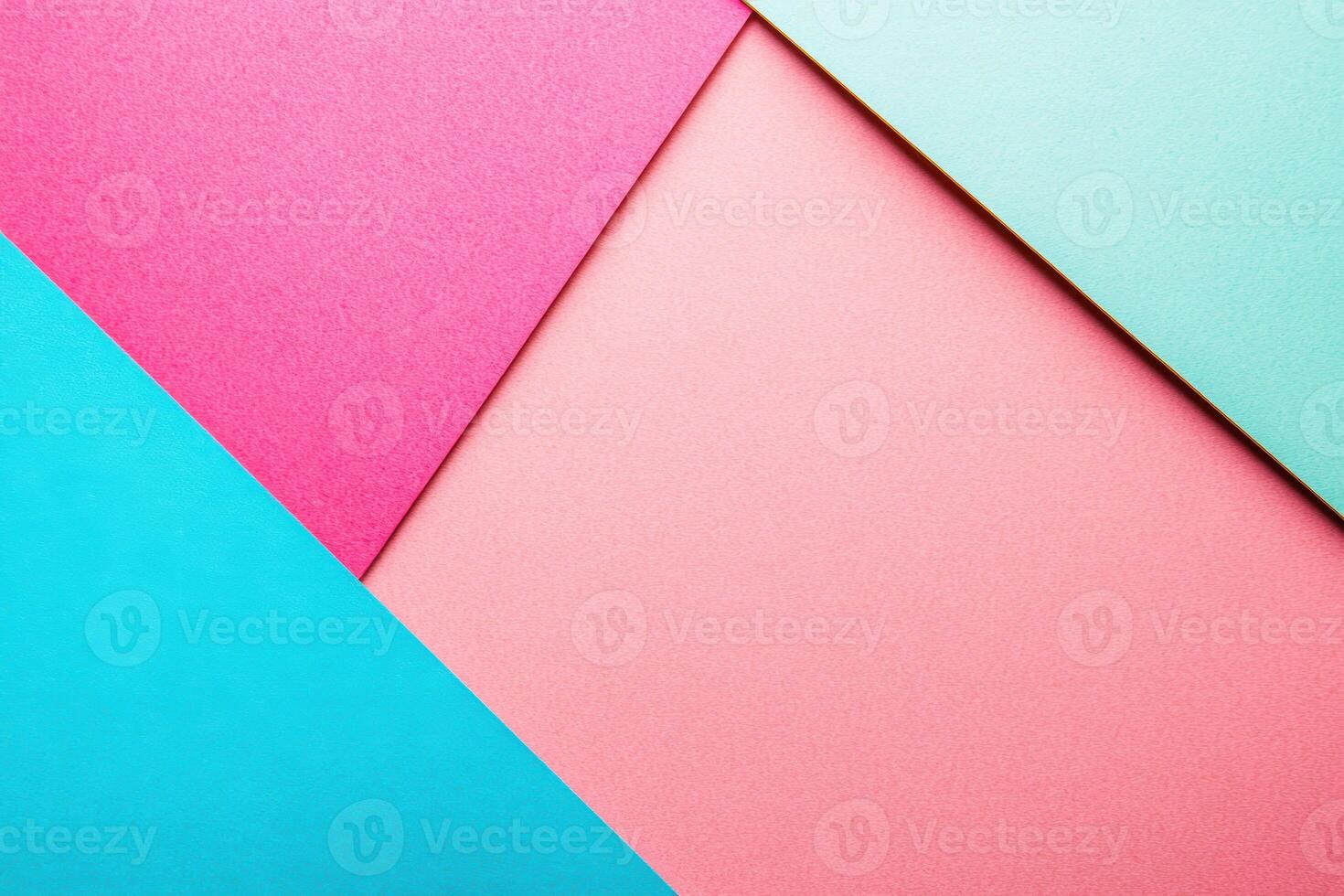 Colorful paper triangles arranged in an abstract pattern photo