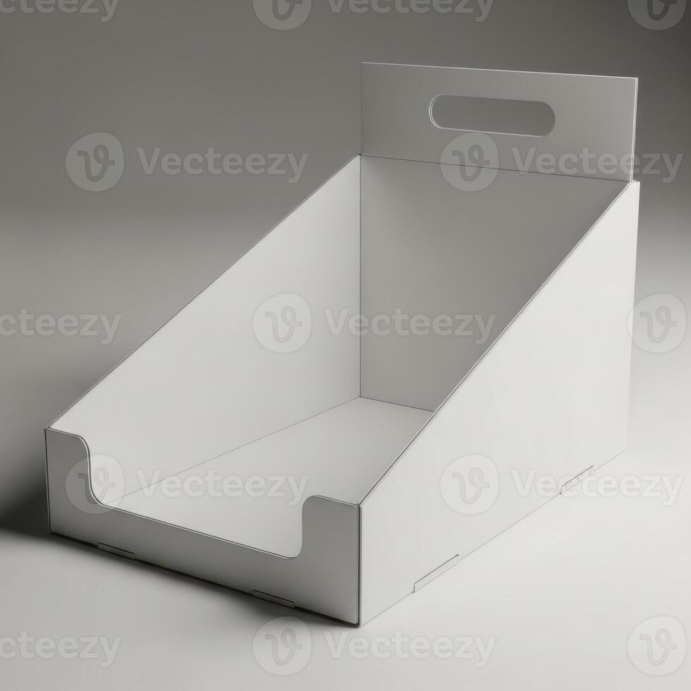 A simple white cardboard display stand with a handle cutout isolated on white background photo