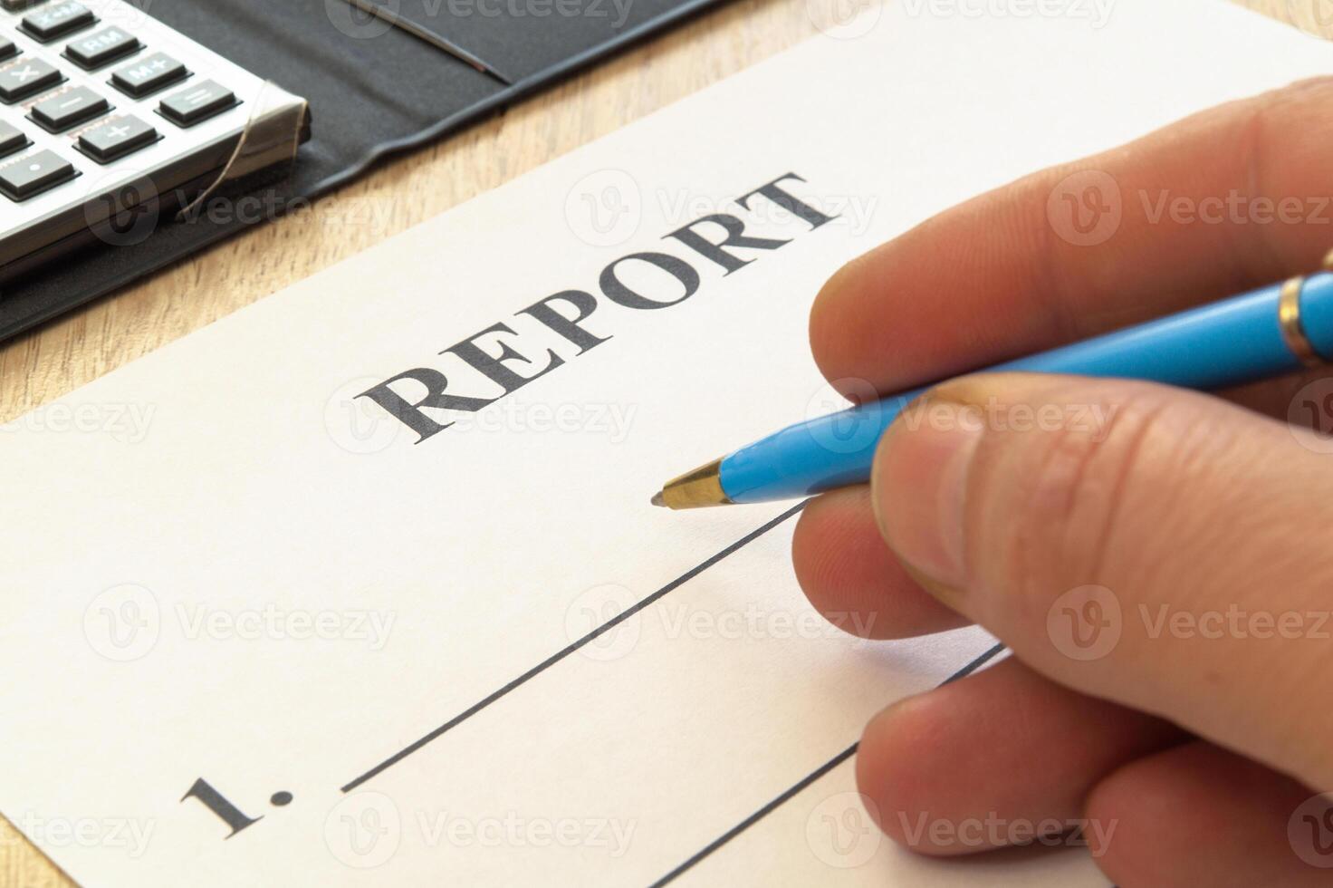 We are preparing report - a form to fill in on a rustic table. photo