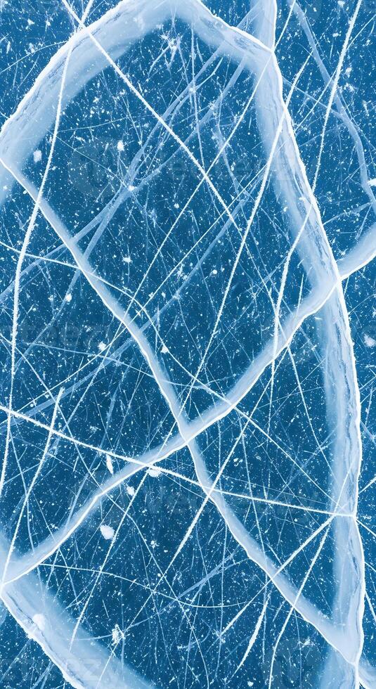 Close-up abstract ice texture with cracks and bubbles vertical pattern photo