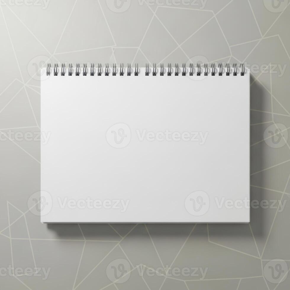 Blank spiral bound notebook open flat showing empty pages isolated on white background photo