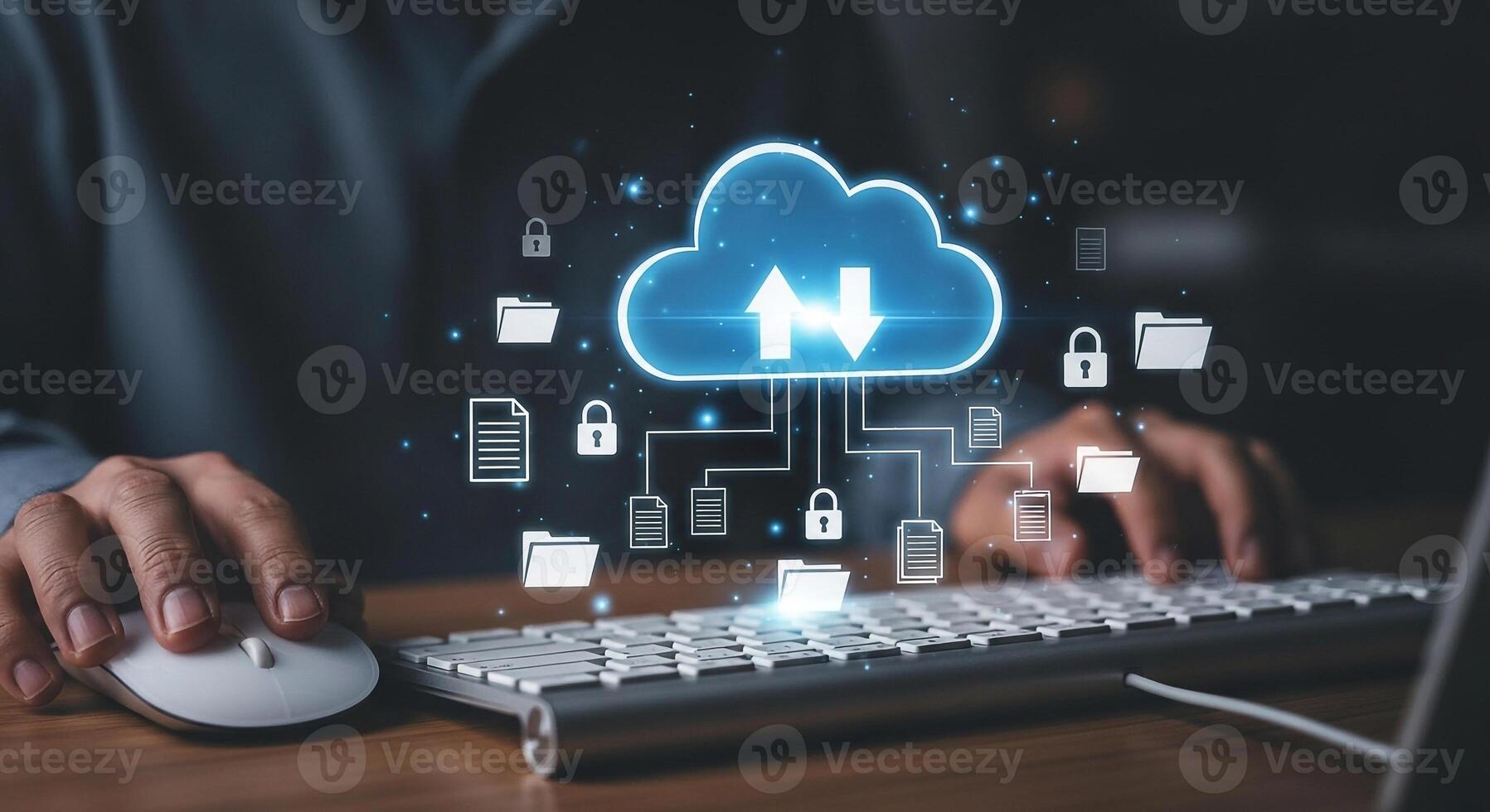 Person managing data transfer to a cloud server, working on a keyboard and mouse at a desk in a modern office, showcasing secure online data storage and networking concept photo