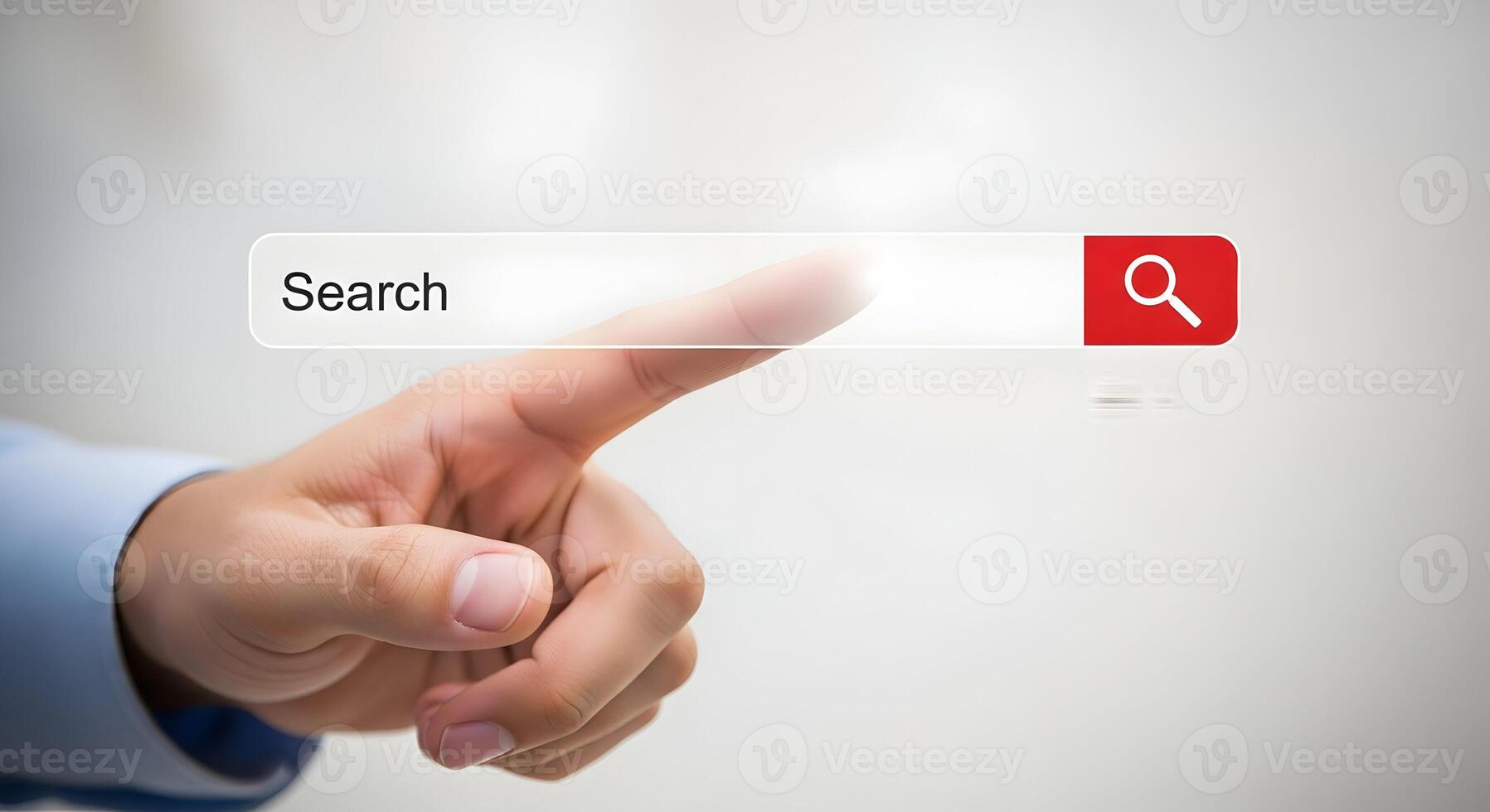 Close-up of a hand using index finger to click on a search bar, with a red magnifying glass icon, on a digital screen concept of internet browsing, search engine, information seeking, and online explo photo