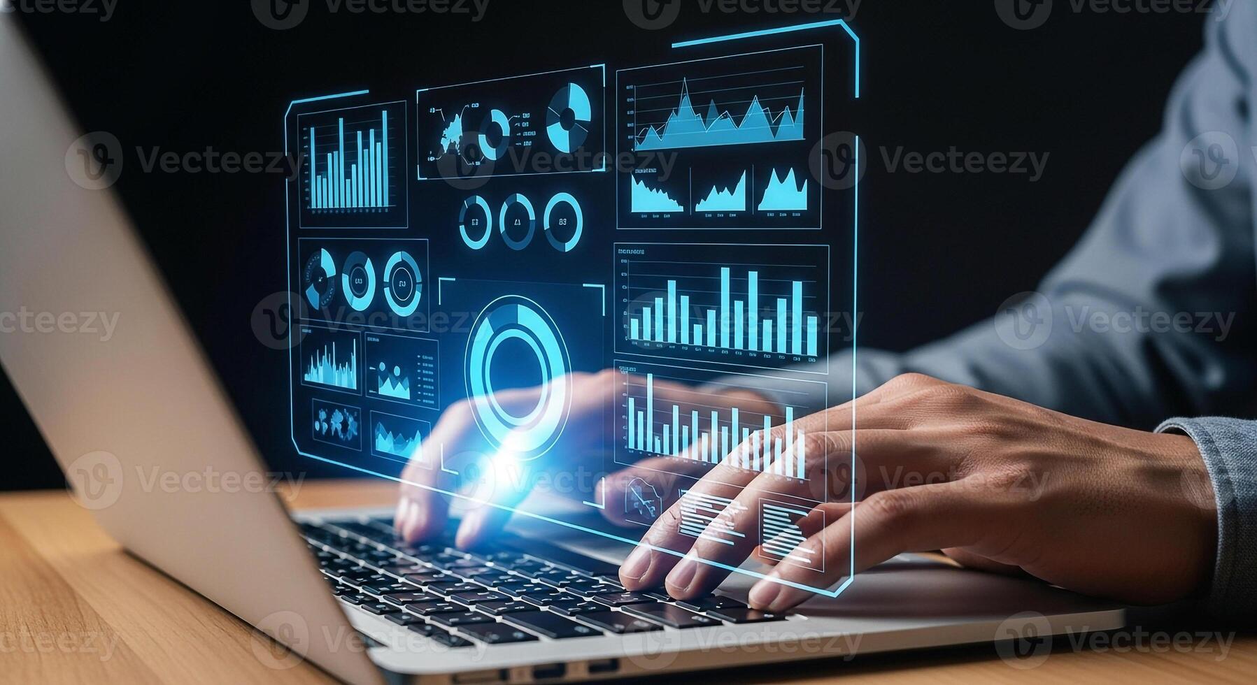 Person analyzing data charts and graphs on laptop screen at night, working late on business analytics and financial reports The futuristic interface displays key performance indicators and financial d photo