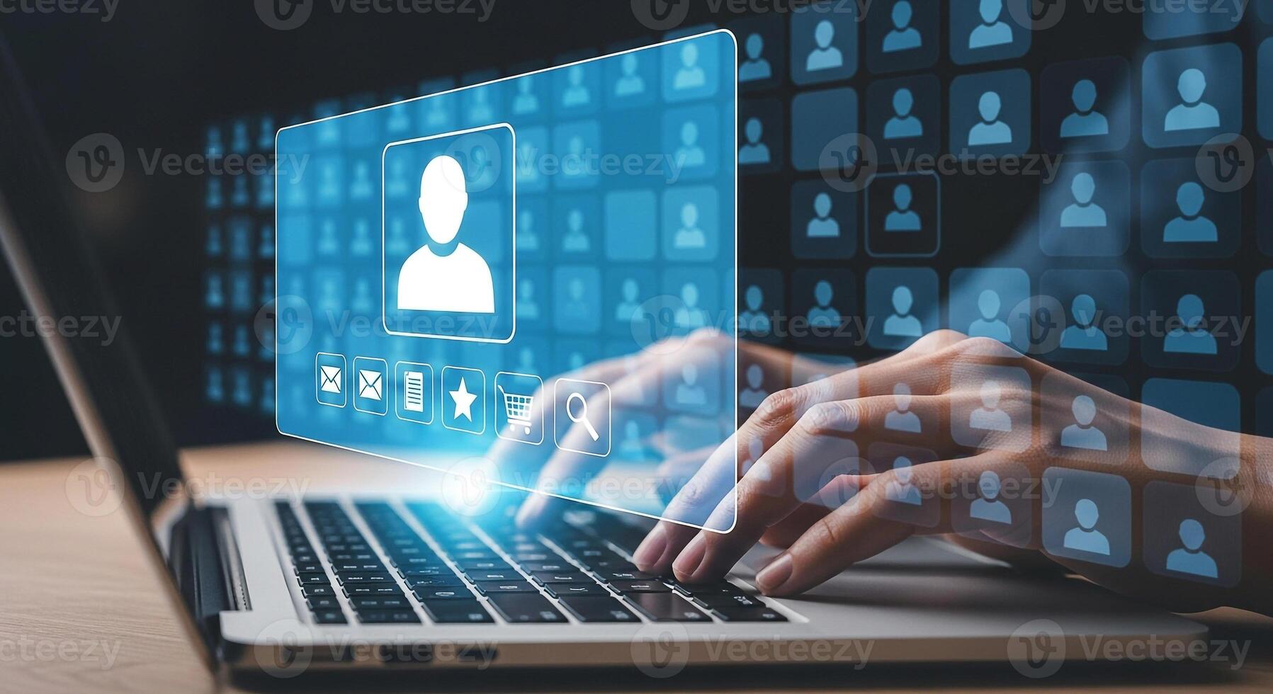 Person managing customer profiles and data using a laptop computer in a modern office showcasing digital database and online interaction concept photo