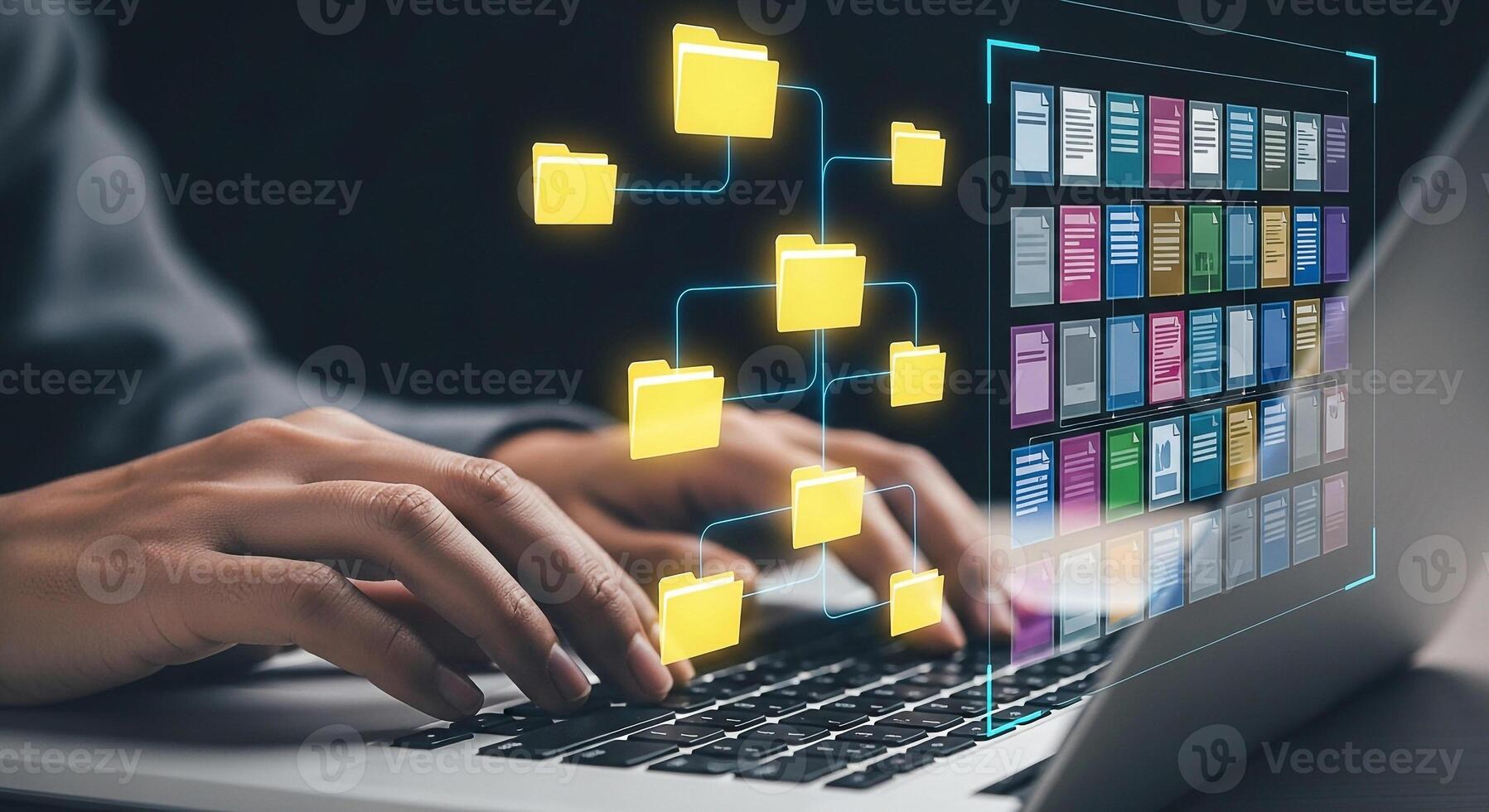 Person managing digital files and documents on laptop efficient online data organization network concept digital workspace photo