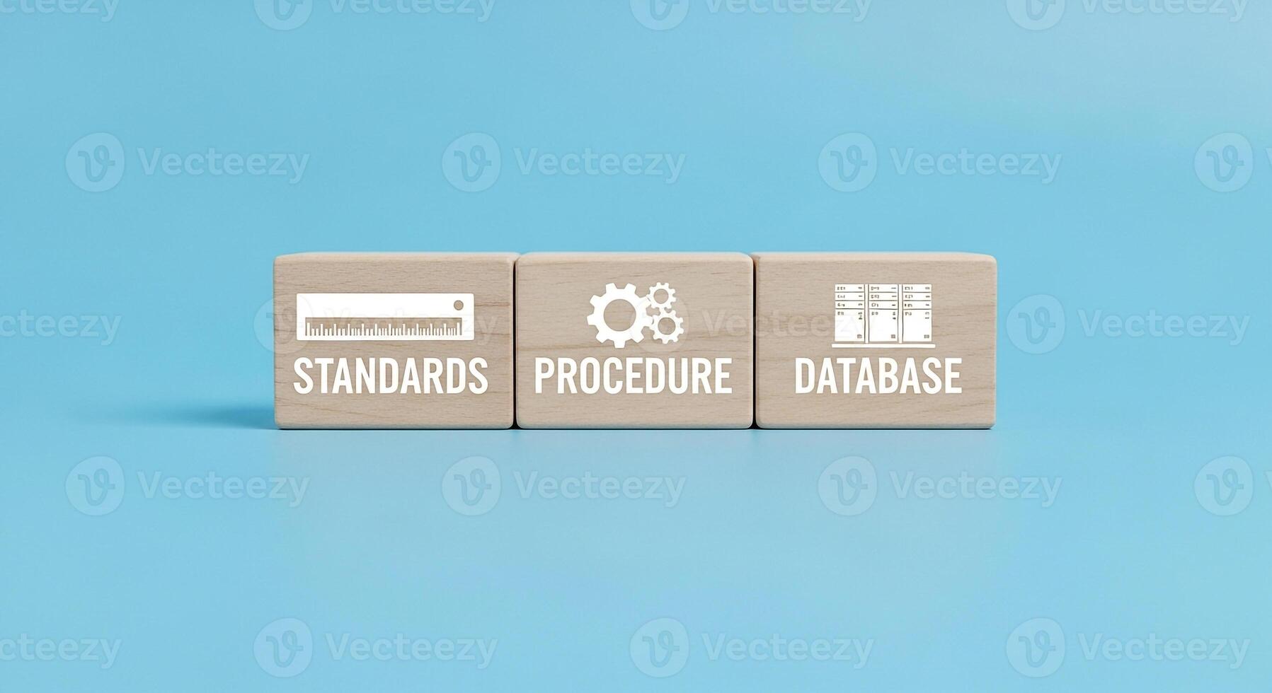 Wooden blocks with icons and text representing standards procedure and database on a light blue background This image symbolizes the essential elements of a structured and organized system highlightin photo