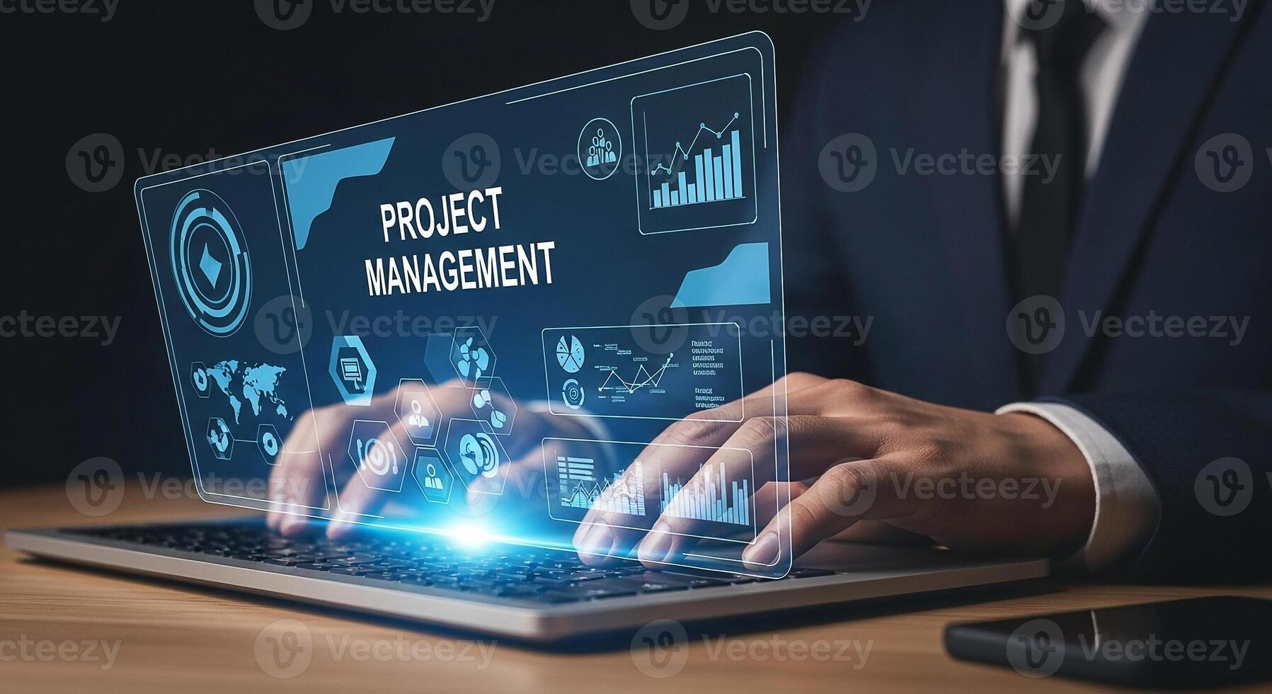 Businessman using laptop computer to manage projects in a modern office demonstrating effective project management and digital technology photo