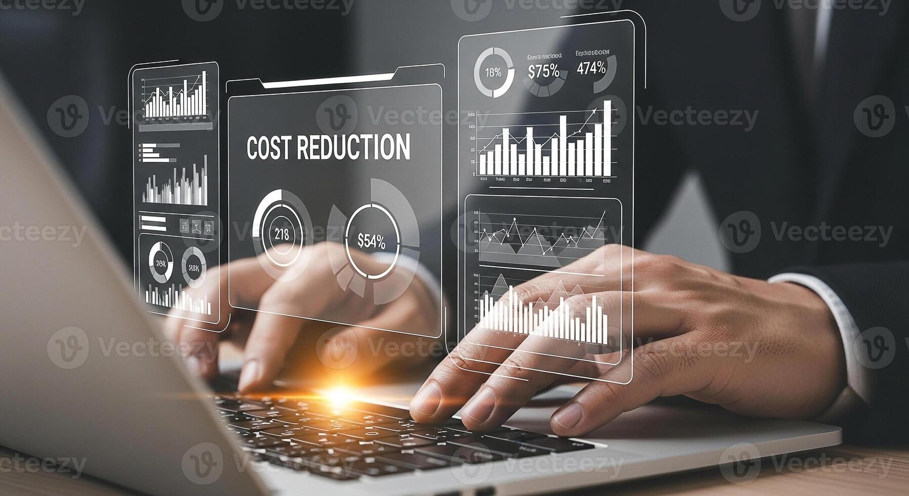Businessman analyzing cost reduction strategies using a laptop with holographic financial charts and graphs in a modern office setting The image depicts a serious and focused professional working dili photo