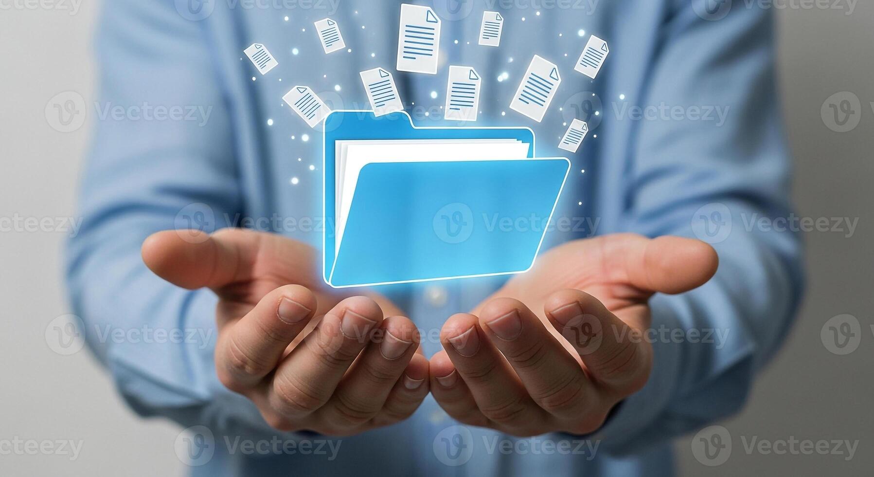Person holding digital folder with documents, showcasing data management and information technology in a modern workspace, representing the concept of secure data storage and online file sharing photo