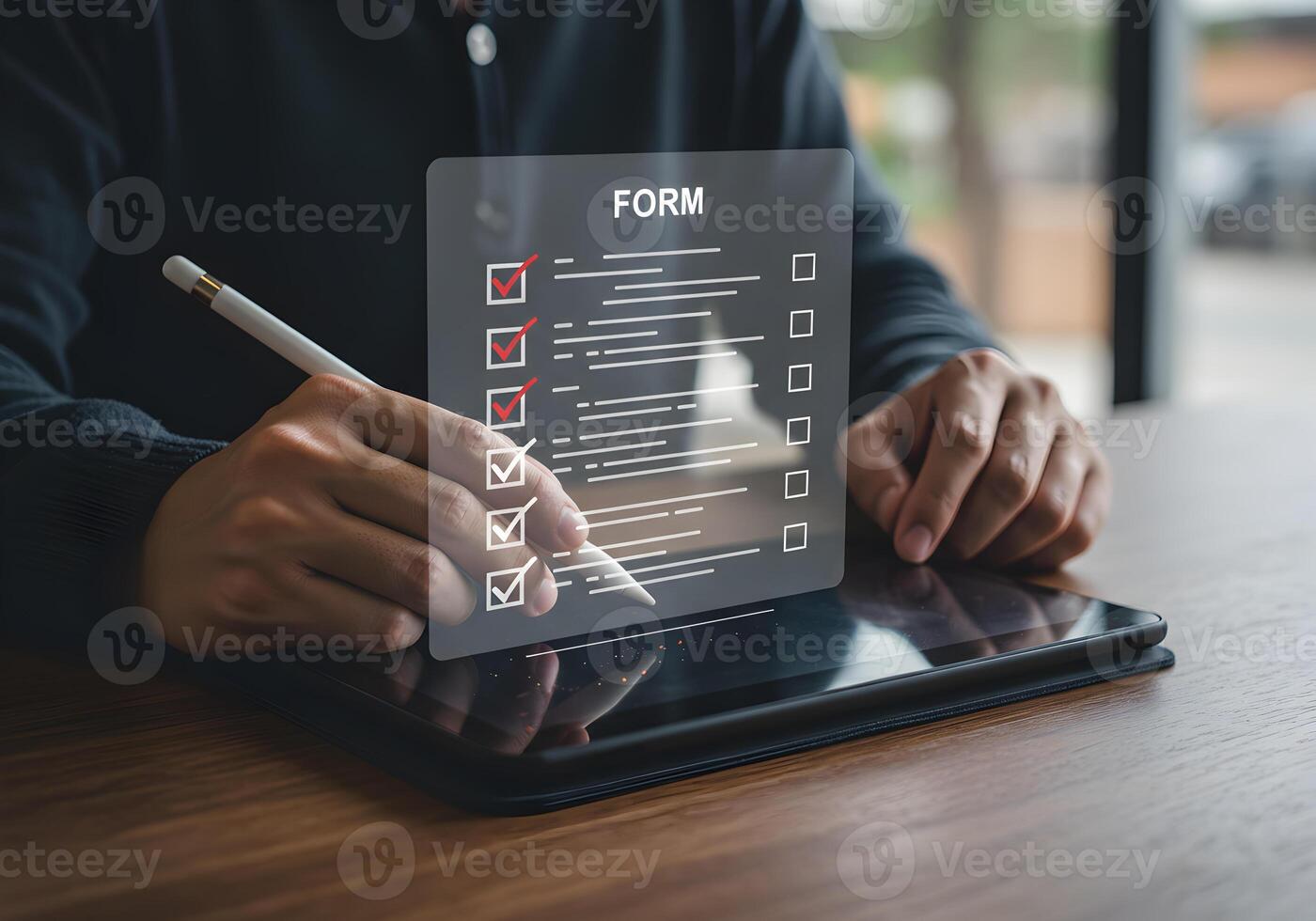 Person completing an online form using a stylus on a digital tablet efficiently managing tasks and achieving goals in a modern workspace photo