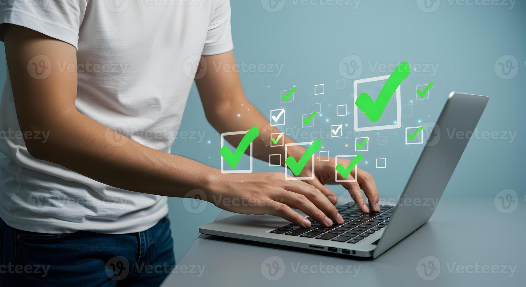 Man using laptop computer checking tasks completing online todo list digital checklist concept successful project completion photo