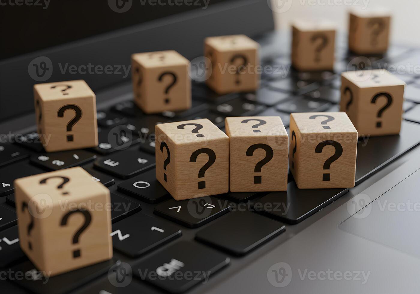 Wooden cubes with question marks on laptop keyboard uncertainty questions problemsolving and digital challenges concept photo