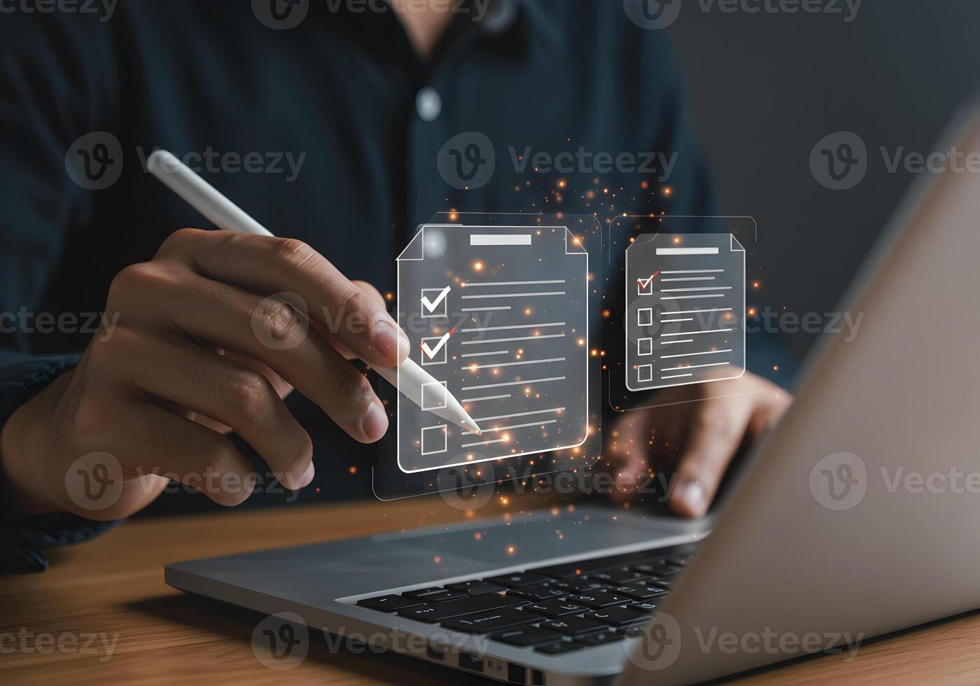 Person using stylus on laptop to check off digital checklist items completing tasks and achieving goals in modern workplace photo