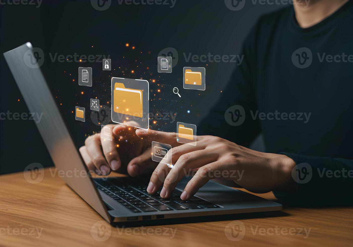 Person managing digital files and folders on laptop online data storage cloud computing digital workspace photo
