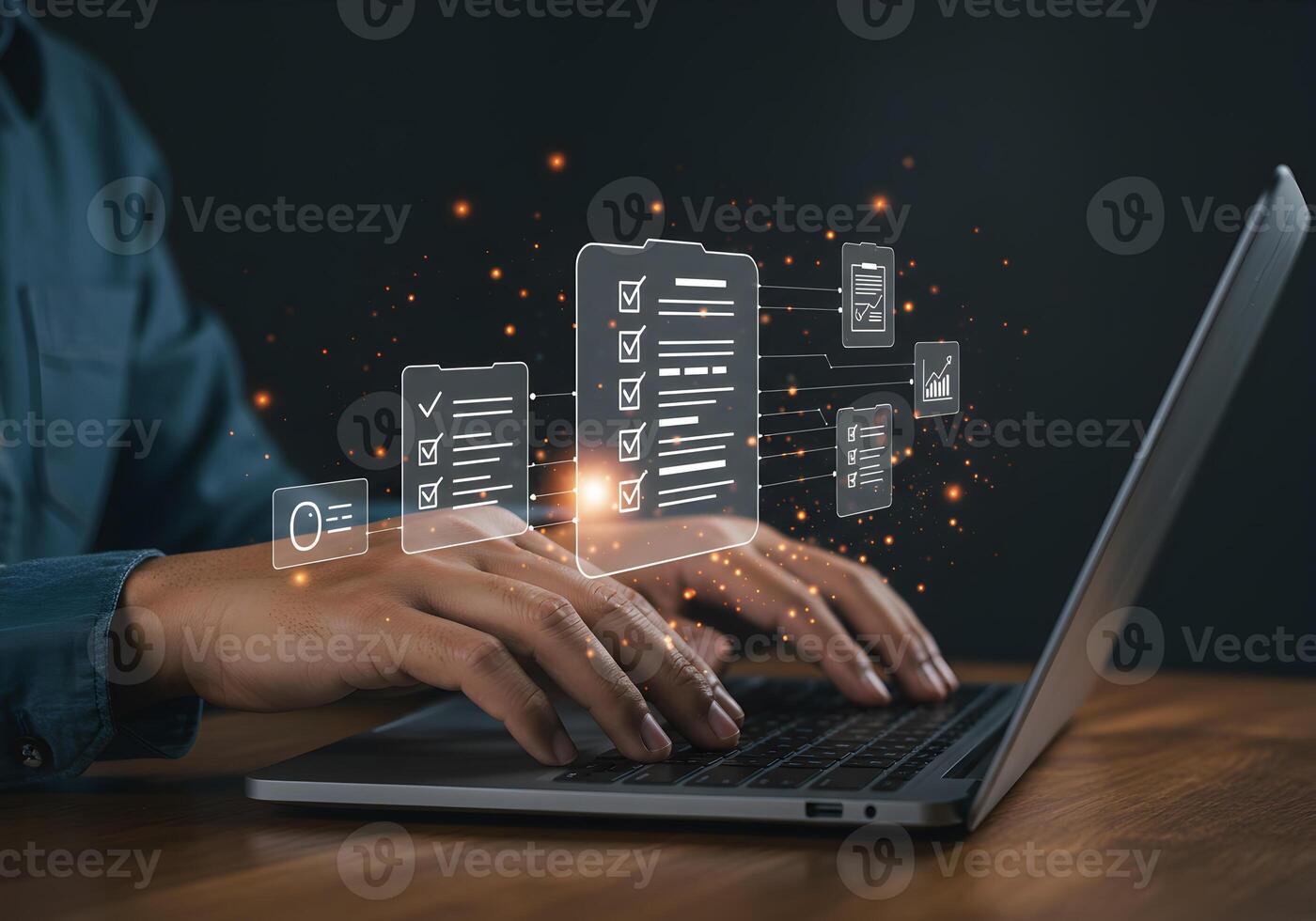 Person working on laptop with digital checklist and project management interface achieving business goals through effective task management and planning The image conveys efficiency productivity and s photo