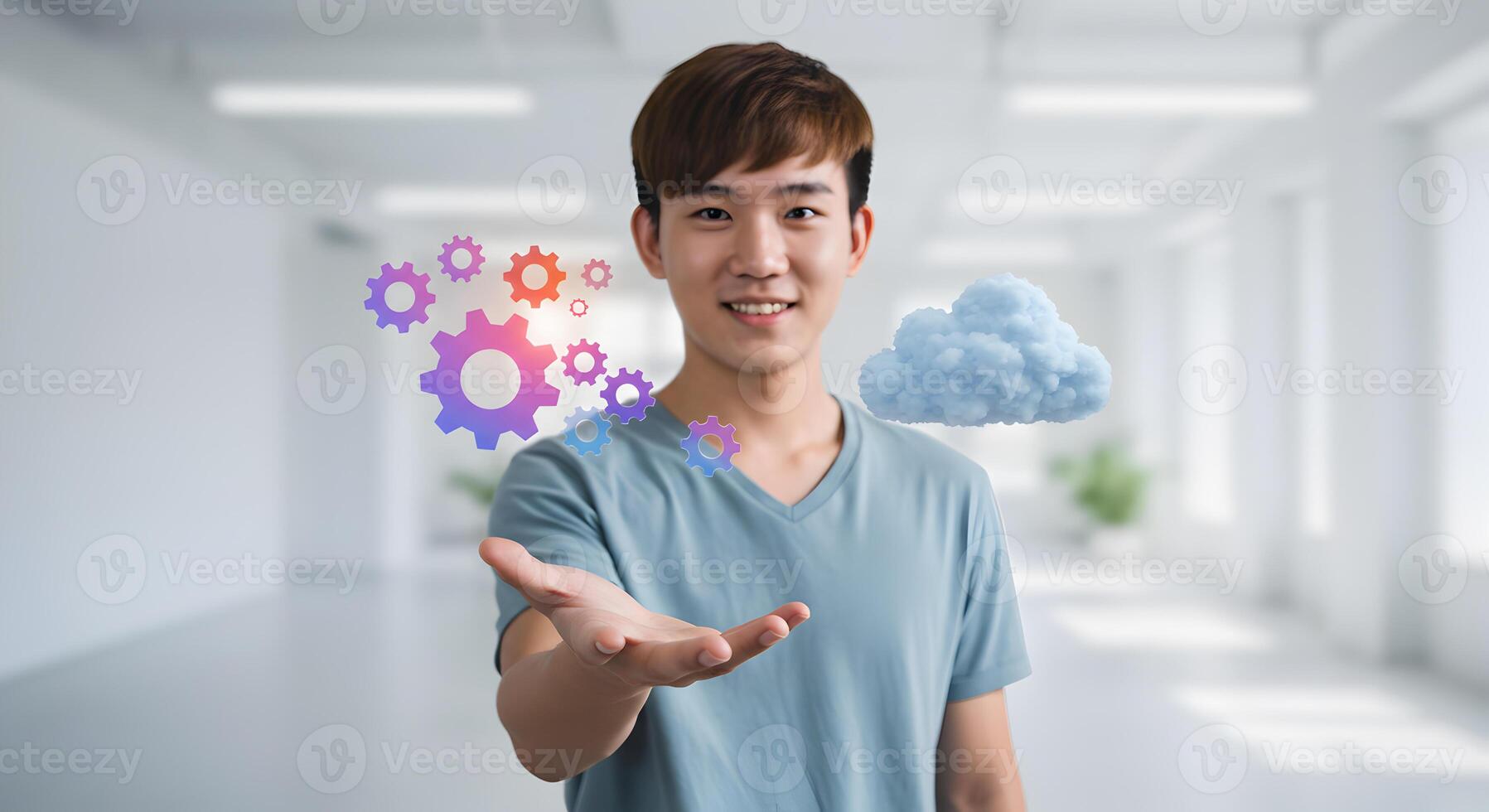 Smiling young man presenting cloud computing and gears in a modern office symbolizing innovation and technological solutions photo
