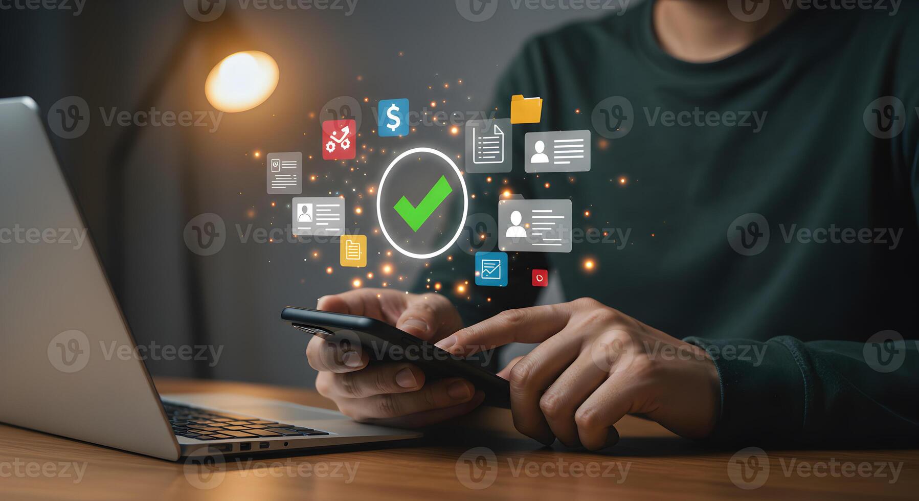 Person using smartphone to manage tasks and data illuminated by warm lamplight in a modern home office setting symbolizing efficiency and digital success photo