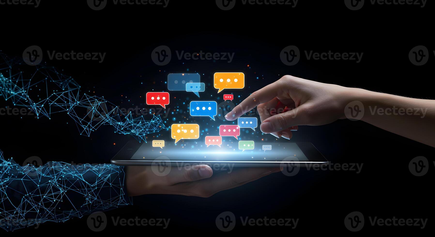 Hands interacting with colorful digital speech bubbles on a tablet symbolizing communication connection and networking in a modern digital world photo