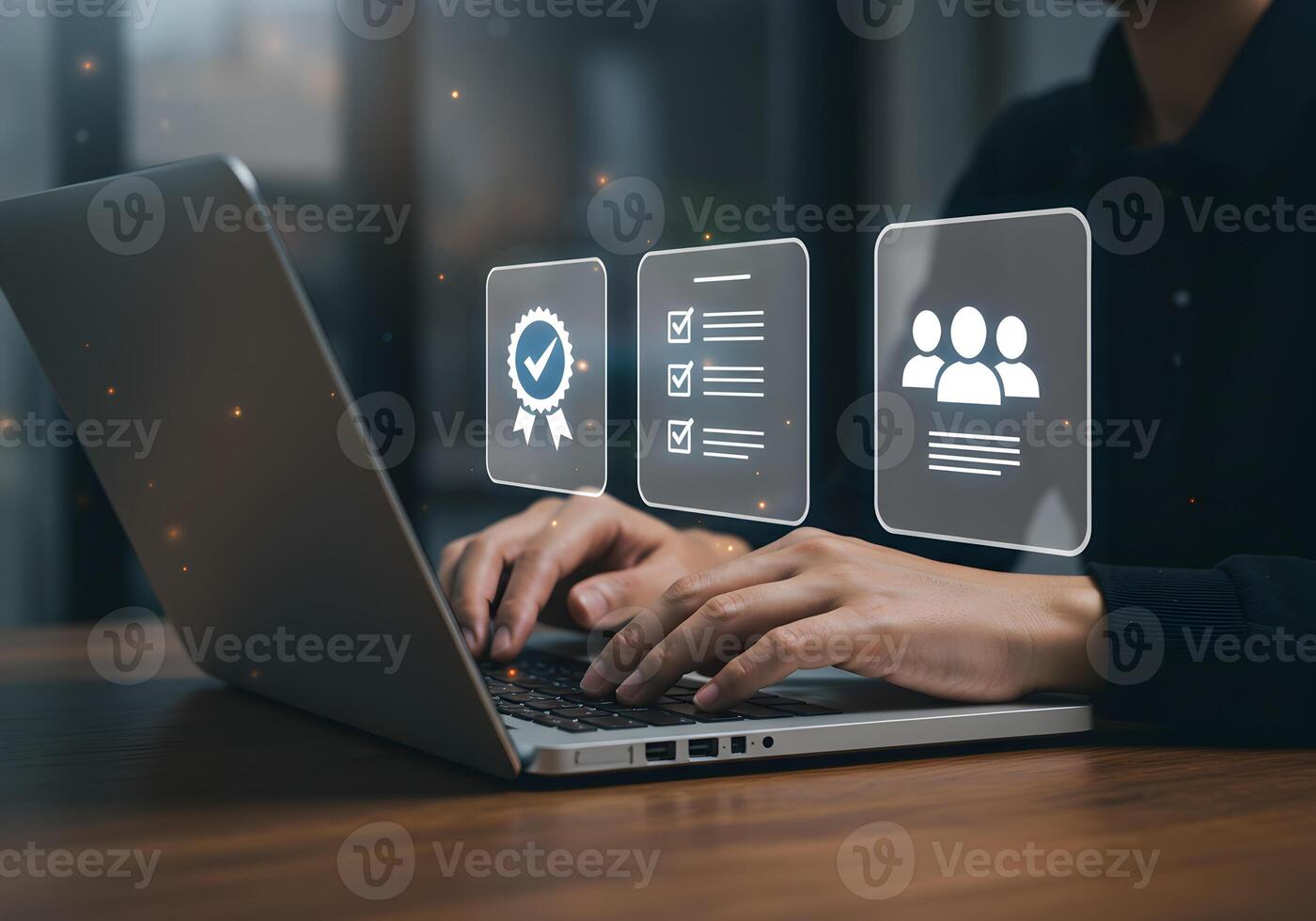 Person working on laptop managing tasks quality control and team collaboration in a modern office setting achieving business success and efficiency photo