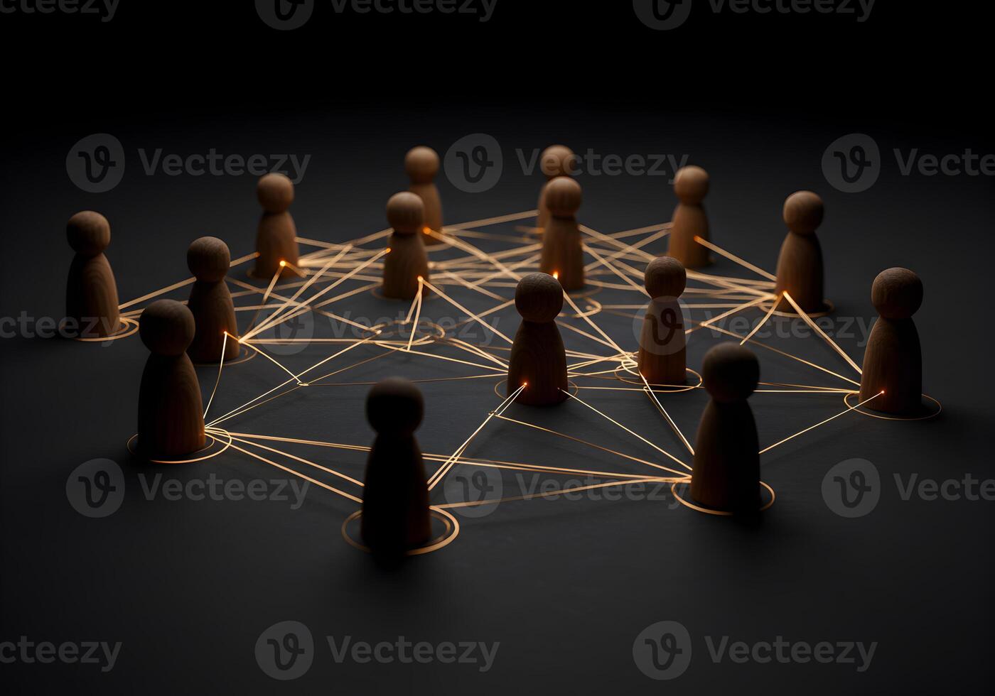 Wooden Figures Interconnected in a Network Symbolizing Global Communication and Teamwork in a Dark Setting photo