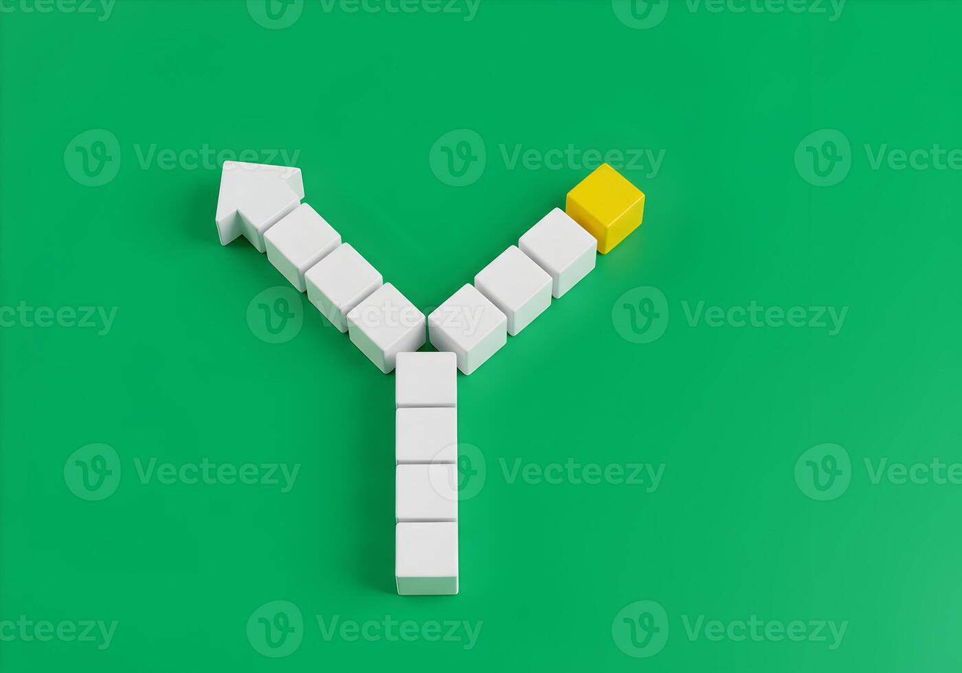 White and yellow blocks forming diverging paths on green background symbolizing choices and decisionmaking process photo