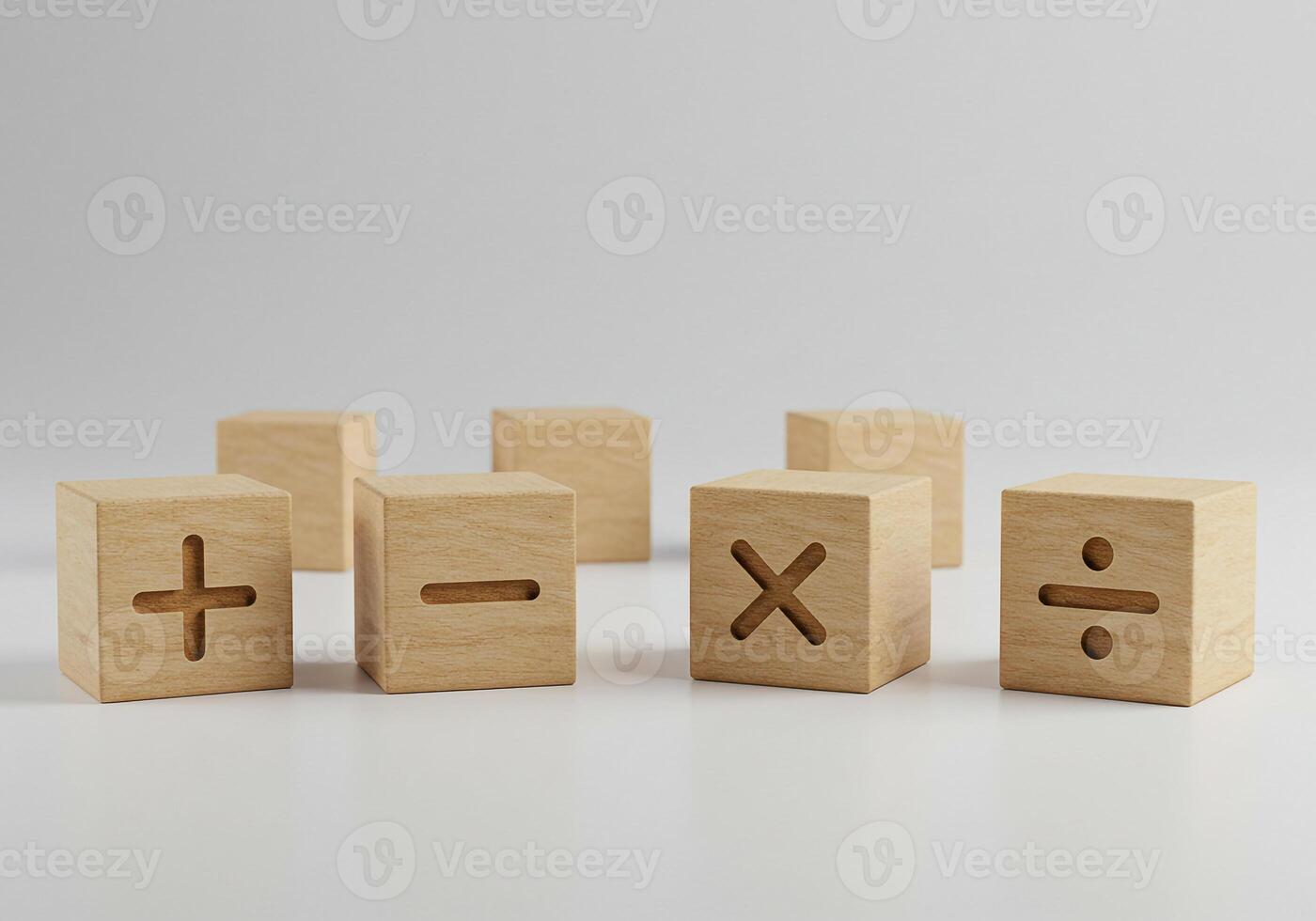 Wooden Cubes with Mathematical Symbols Arranged on a White Surface Addition Subtraction Multiplication and Division in a Minimalist Setup Representing Calculation Math and ProblemSolving Concepts photo