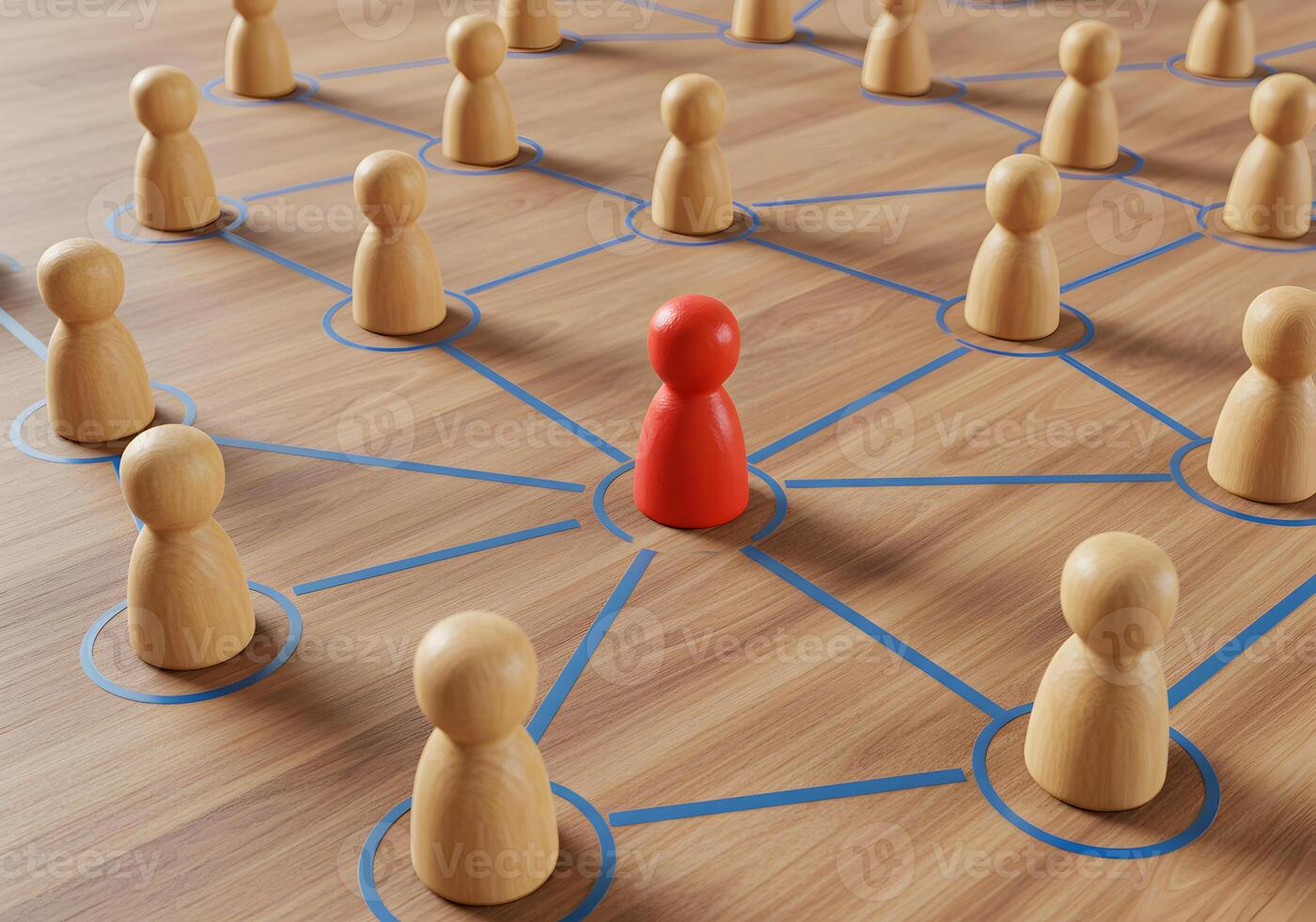 Red leader connecting with a network of wooden figures on a wooden table symbolizing networking leadership and teamwork in business or social contexts photo