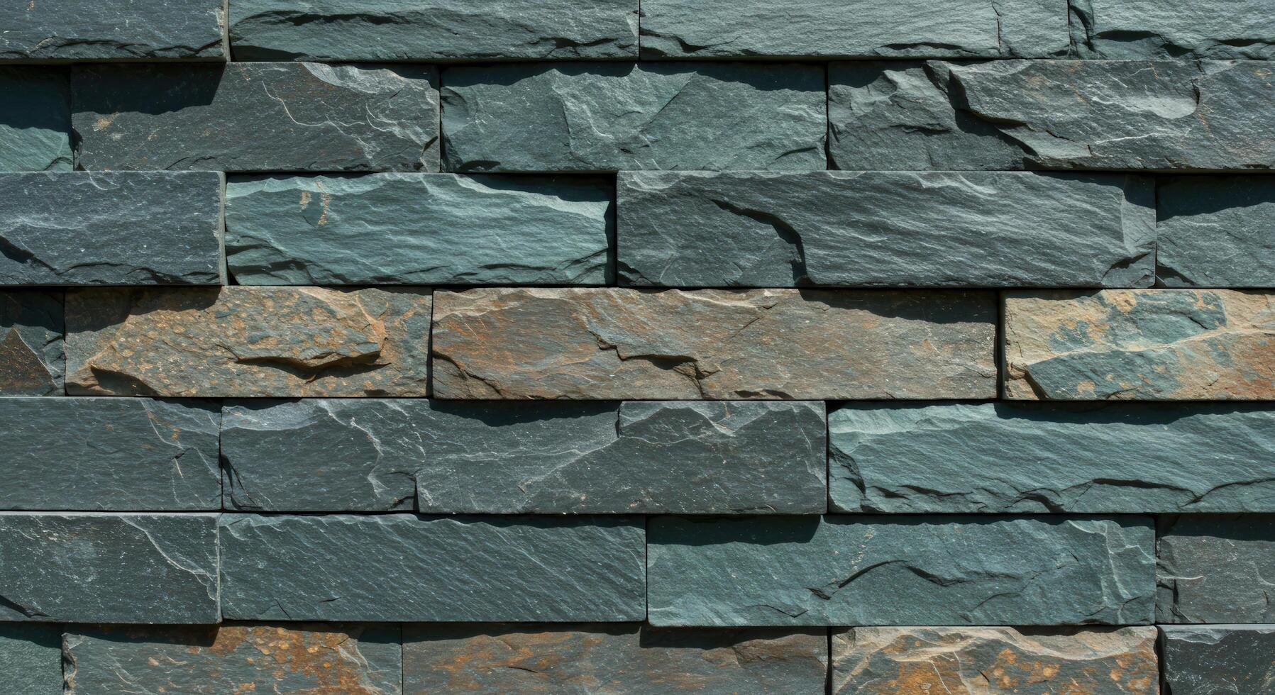 Stone cladding wall texture with slate rock brick pattern background photo