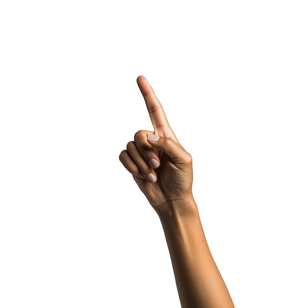 A hand pointing upwards with the index finger extended against a plain white isolated background scene view photo