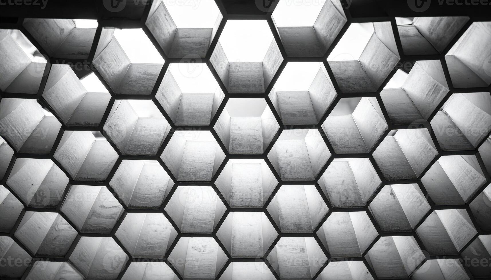 Diffuser honeycomb grid casting gentle monochrome pattern central copy space representing lighting texture suitable for technology architecture and product backdrops photo