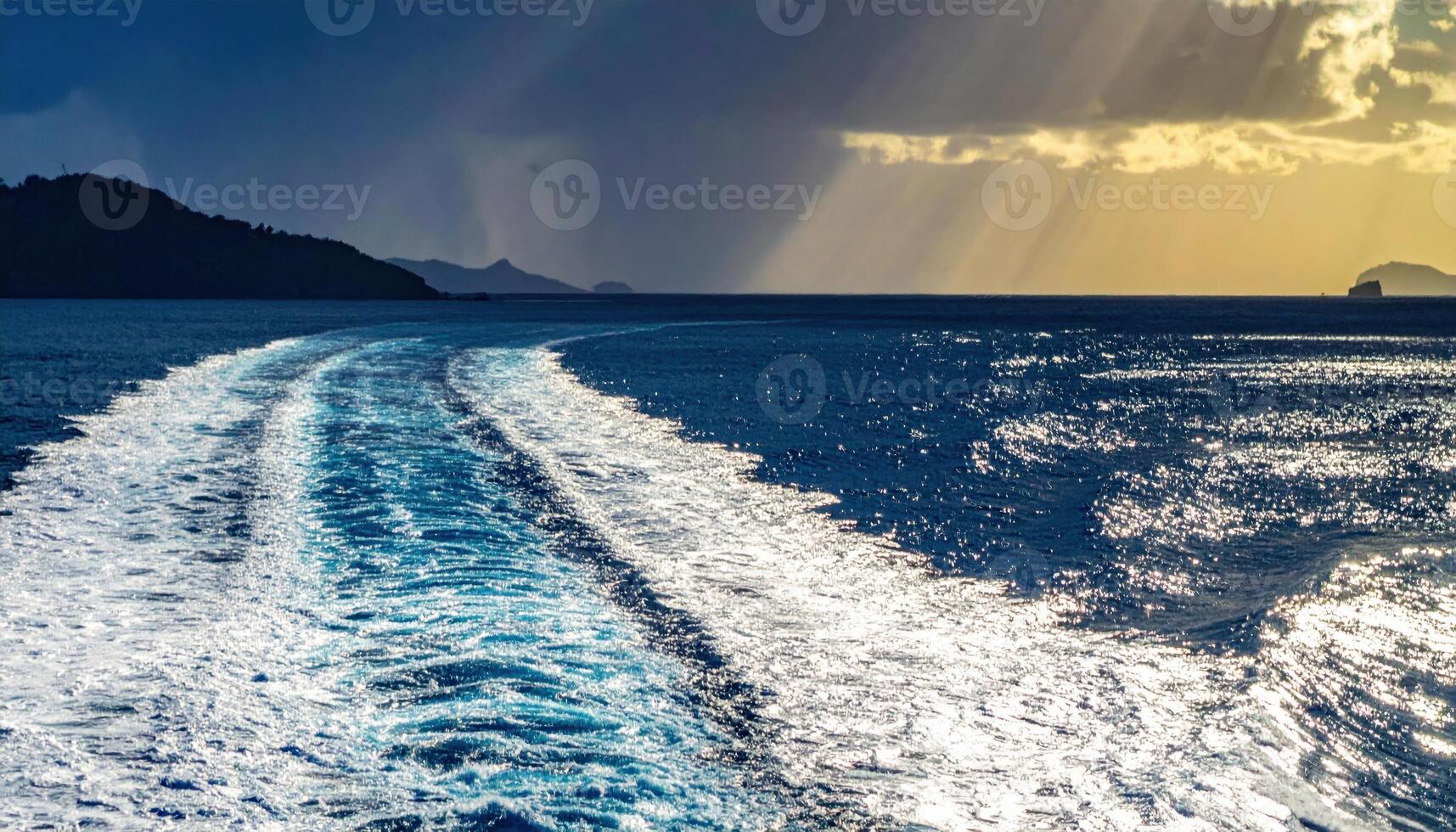 Long tidal race between headlands with converging ripple trains representing marine hydrodynamics and elegant surface patterns suitable for education features travel stories and clean design photo