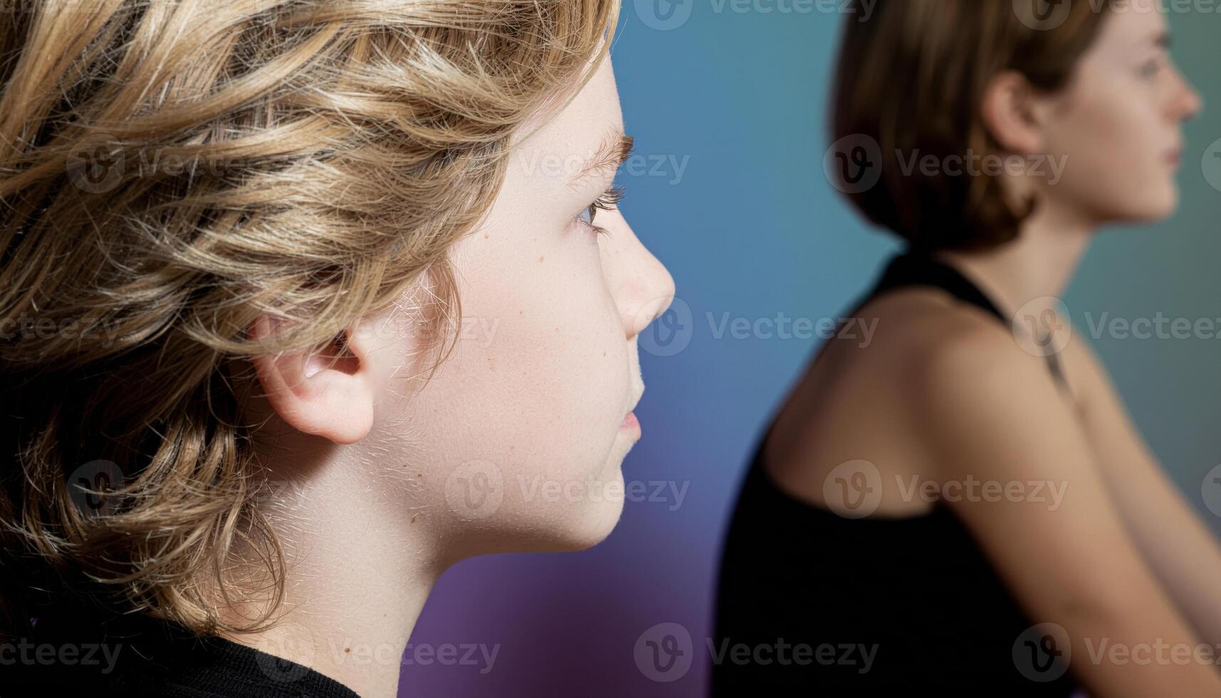 Young child in contemplative ease three quarter profile top soft key smooth gradient background thoughtful studio portrait for learning wellness and lifestyle messaging photo