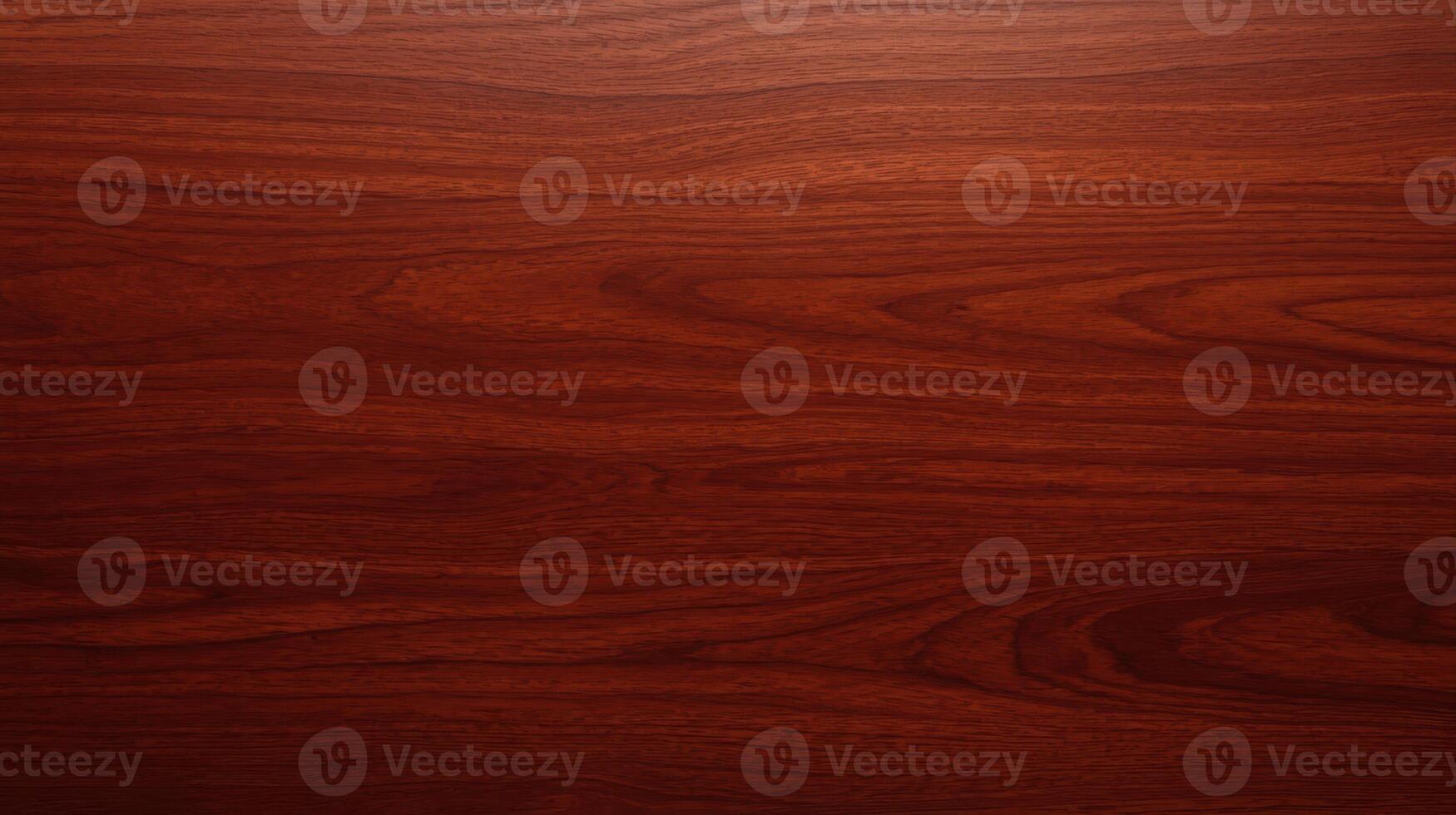 Warm reddish-brown wooden surface with a smooth grain, showing natural patterns and subtle variations in tone across the horizontal texture of the timber board. photo