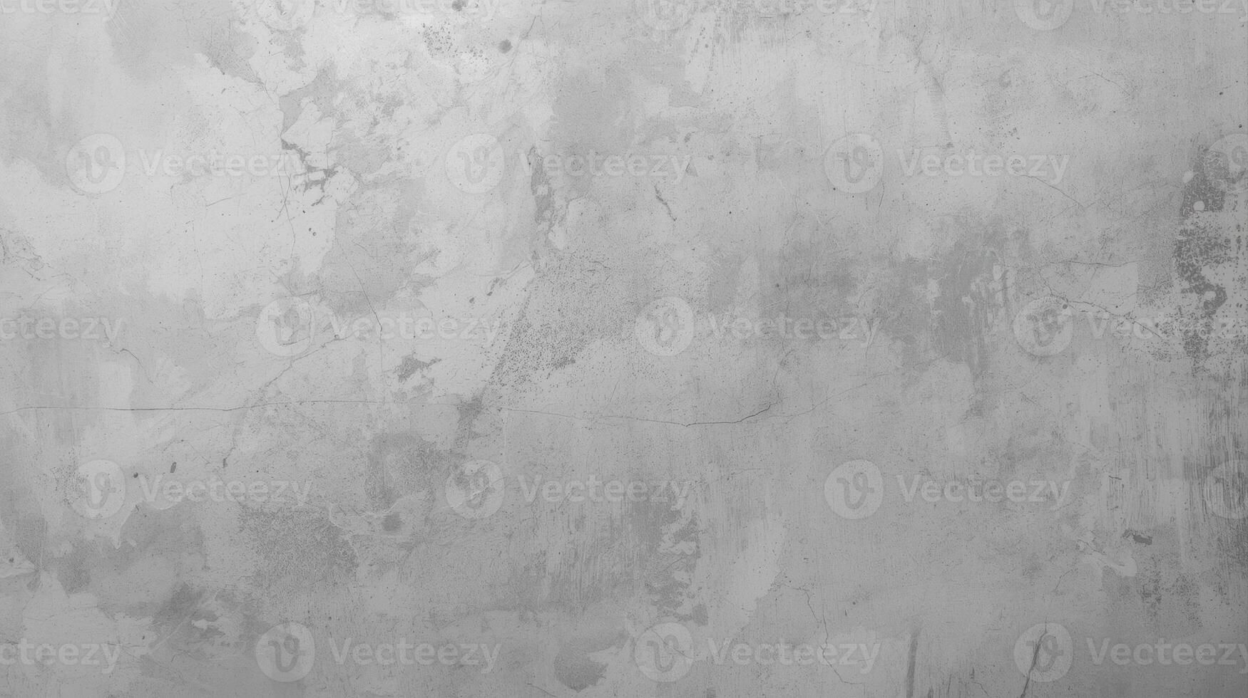 Subtle variations in the light reflecting off a weathered gray concrete wall create an abstract textured background perfect for design projects and presentations. photo