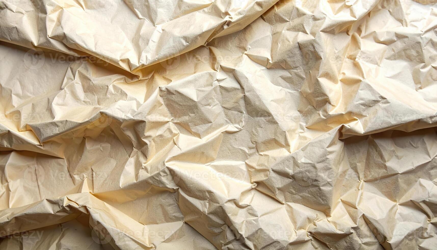 A close-up photograph showcases the intricate textures of a beige crumpled paper surface, emphasizing its abstract patterns and irregular folds in a simple composition. photo