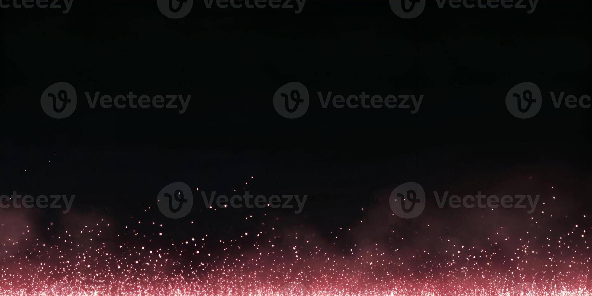 Red glowing particles rise from the bottom against a dark black background creating a dynamic light effect photo