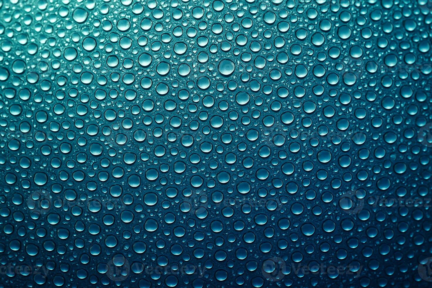 Gradient blue background with evenly distributed small droplets creating a smooth reflective texture. photo