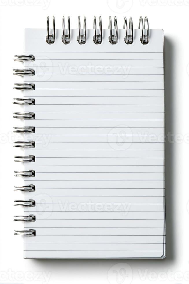An overhead, isolated view of a small, lined notepad with spiral binding photo