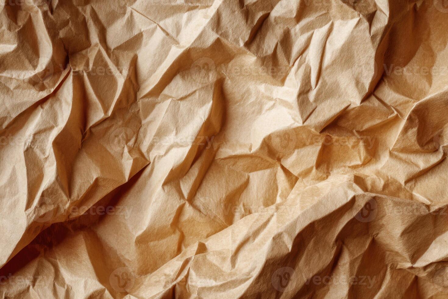Recycle brown paper crumpled texture. Wrapping craft old paper surface for background. Crinkled Kraft Sheet. Textured Cardboard Backdrop. Full frame. Copy space. Concept of using recycled materials. photo