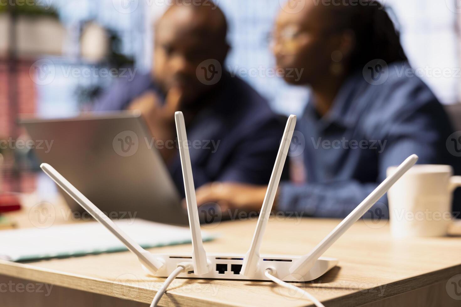 African American man and woman checking with the internet provider for support, discussing possible solutions to their ongoing Wi Fi connectivity issues. Troubleshooting the errors. photo